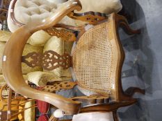 Victorian walnut open back armchair with pierced fretwork splats, cane panel seat,