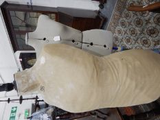 Modern dressmaker's mannequin, adjustable and a vintage mannequin,