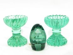 Victorian green glass dump paperweight with central floral decoration,