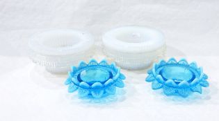 Pair of opalescent pressed glass light bases of circular form with ribbed decoration,