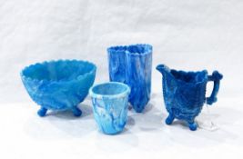 Victorian blue pressed glass vase of triangular lobed form, decorated with holly, 10cm high,