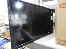 Logik flatscreen television with stand and remote,