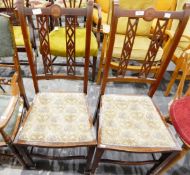 Pair of Edwardian mahogany occasional chairs with pierced latticework splat backs,