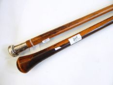 Malacca walking cane with silver finial bearing the crest for the Wiltshire Regiment and a lignum