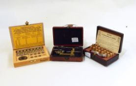 French/Swiss brass clockmaker's tool in case, inscribed 'Outil A Centrer',