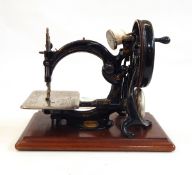 Wilcox & Gibbs automatic silent sewing machine within its original case,