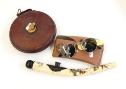 Leather cased measuring tape marked 'Chesterman, Sheffield, England', a pair of Rayban sunglasses,