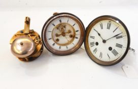 Brass clock movement by H J & Co, Paris, four other circular clock movements, pendulums,