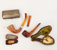 Meerschaum pipe modelled as a hand holding an egg with chicks hatching from it, with silver collar,