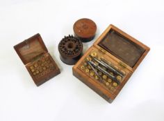 Two wooden cased sets of small brass circular watchmaker's drills and a wooden case of small drill