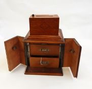 Smoker's compendium with two drawers, within wooden case,