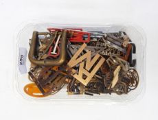 Collection of monograms including brooches, buckles, etc.