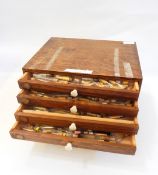 Quantity of watchmaker's jewels, wheels and other watch parts in cork and glass files,