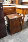Edwardian mahogany coal box, with hinged front enclosing liner, on squat bracket feet,