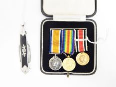 Pair of marcasite and enamel decorated folding lorgnette and three miniature WWI medals