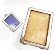 Silver photograph frame, Birmingham 1942, of rectangular form with stylised leaf border, 19.