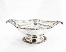 Edwardian silver pedestal bowl, London 1902, of shaped oval form with scroll and gadrooned borders,