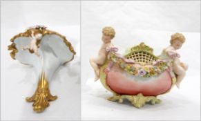 Noritake porcelain wall shelf, handpainted with floral garlands, moulded gilt scroll rim,