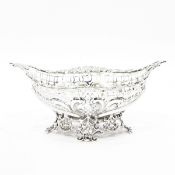 Victorian silver bonbon dish by William Comyns, London 1891, of shaped oval form with pierced sides,