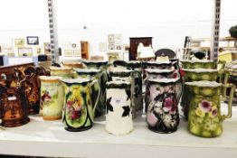 Six sets of various graduated jugs,