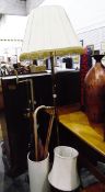 Brass standard lamp with shade, two brass table lamps,