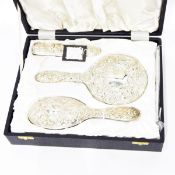 Modern silver dressing table set, 4 pieces : mirror, brush, clothes brush and comb,
