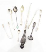 Silver-handled button hook decorated with a daffodil in relief,