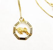 9ct gold Taurus pendant depicting a charging bull, on 9ct gold box-link chain, approx.