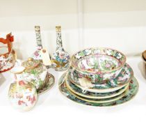 Pair of famille rose bottle vases, each painted with gilt dragon on a floral ground, 18cm high,