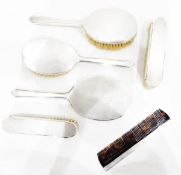 Six-piece silver dressing table set by Mappin & Webb, London 1944, of engine turned design,