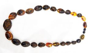 Baltic dark amber bead necklace of graduated oval partly polished beads