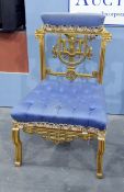 Continental-style gilt painted salon/bedroom chair with padded crest rail, carved lion's masks,