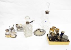 Square cut glass inkwell with silver plated collar, a silver plated cruet set,