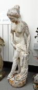 Reconstituted stone garden ornament of a maiden, on a circular plinth,