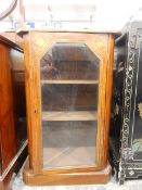 Edwardian inlaid walnut music cabinet on plinth base,