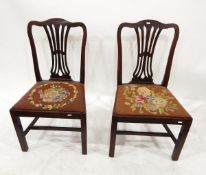 Pair of early 19th century Hepplewhite-style mahogany chairs with woolwork embroidered drop-in