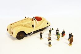 Schuco Examico 4001 plastic and tinplate clockwork car and box of Hornby 'OO' miniature passengers