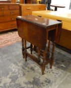 Oak fall-flap gate-leg table on turned supports,