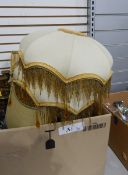 Pair of table lamps bearing different shades, another table lamp,