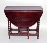 Oval oak fall-flap gateleg table on spiral turned supports (repolished)