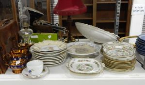 Quantity of dessert plates with matching cake plates, cream with flower decoration to the centre,