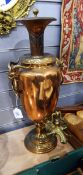 Copper and brass samovar with grotesque horned masks, ring handles,