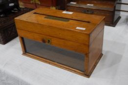Late 19th century oak house letter box with brass 'Letters' label, the front with glazed panel,
