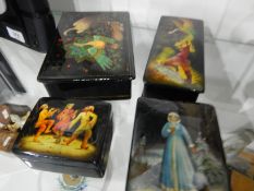 Three Fedoskino Russian lacquer boxes of various rectangular forms,