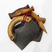 Collection of old dough cutters including steel dough cutters with wooden handles,