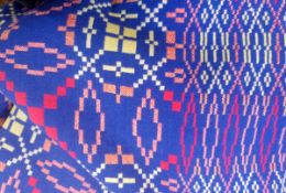 Welsh-style embroidered large rug and a large grey tweed blanket (1 box)