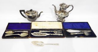 Pair of Victorian silver plated fish servers, another pair with rose decorated handles,