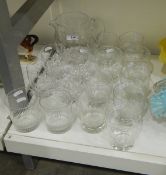 Cut glass water jug with four matching glasses and assorted other cut glass tumblers (16)