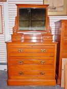 Edwardian satin walnut dressing chest having bevelled plate pivoted mirror over two lace drawers,