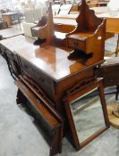 Edwardian mahogany dressing chest, the pivoted mirror with fret carved pediment,